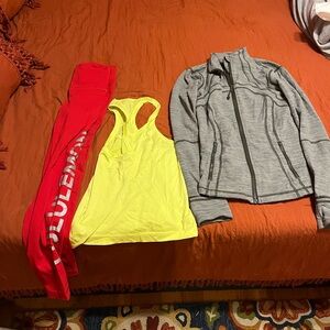 Lululemon Athletica Red Leggings, Neon Yellow Tank, and Gray Jacket